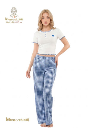 Like lingerie 7123 بيجامه, elegant women's nightwear set with lace and soft fabric, displayed on a flat surface.