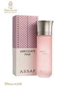 Assaf Assaf Arrogate Pink Eau de Parfum bottle with pink liquid and elegant packaging, showcasing a luxurious fragrance design.